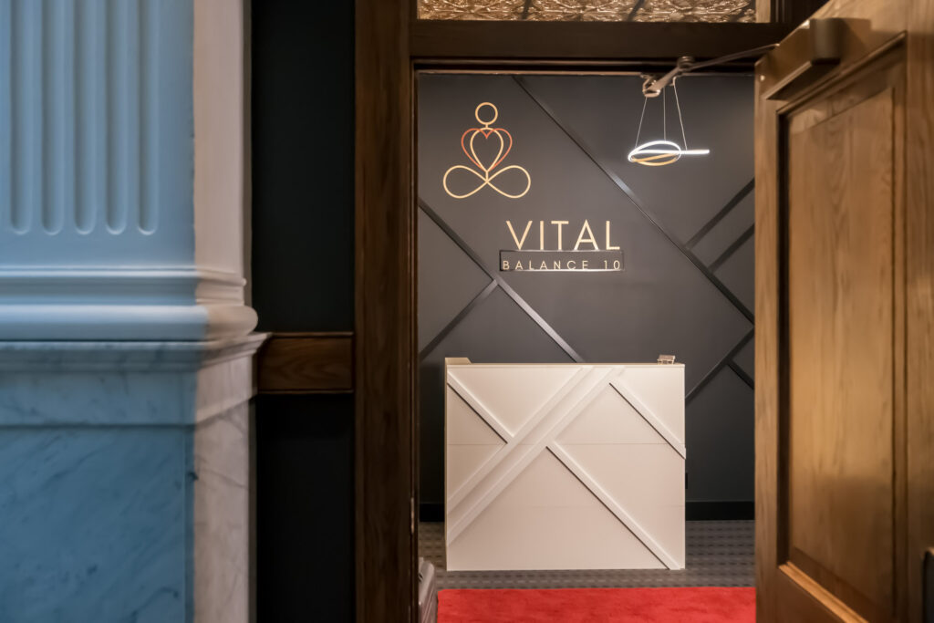 The entrance and front desk reception of Vital Balance 10, a med spa for facials in Canton.